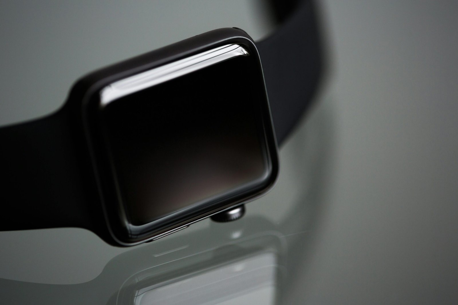 Detailed close-up of a stylish modern smartwatch with a black band, ideal for tech enthusiasts.
